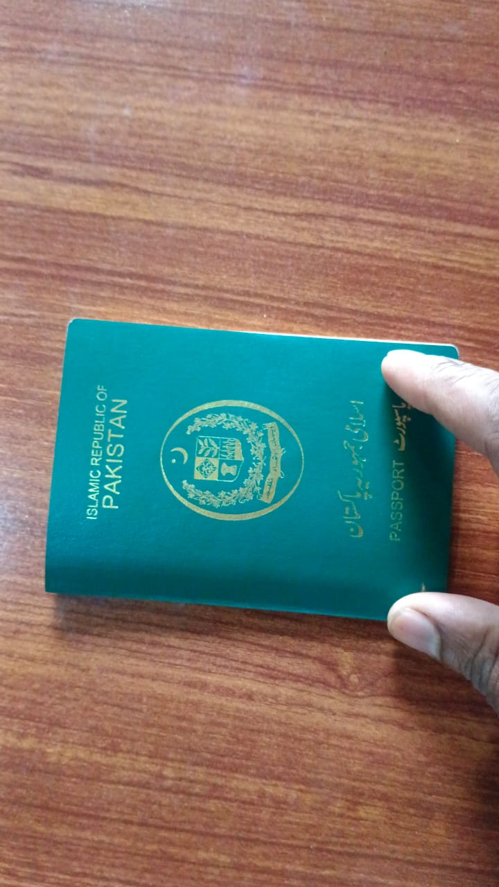 Closed passport with Poland visa