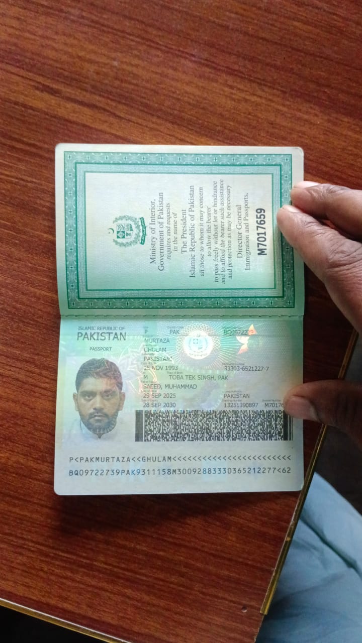 Open passport showing Poland visa stamp